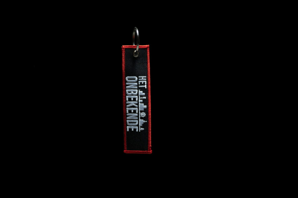Sleutelhanger Het Onbekende – voorzijde